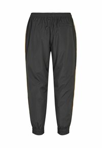 Pantalon de survêtement noir avec taille élastique, bandes latérales et poignets élastiques, vu de dos avec une poche arrière unique sur le côté droit.