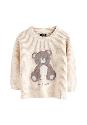 Crèmekleurige gebreide kinderpullover met een zittende bruine teddybeer en de tekst "bear hugs" op de voorkant.