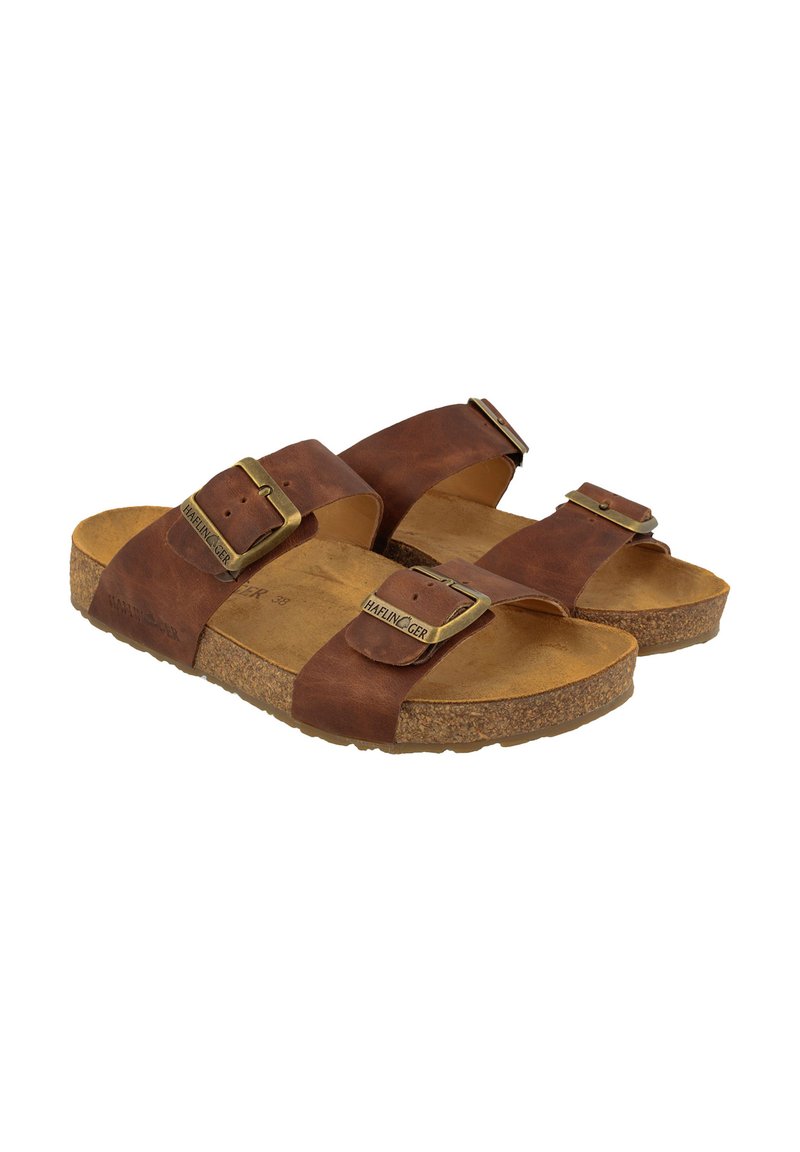 Sandali in pelle marrone con due cinturini regolabili, fibbie in ottone e una soletta in sughero testurizzata per il comfort.