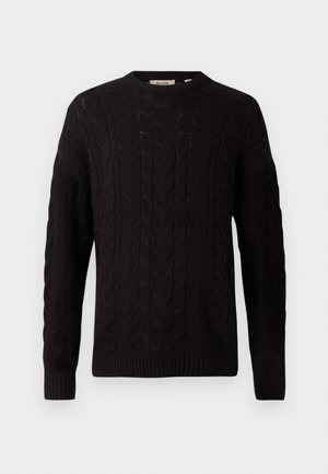 Must must ning proovil õmblustel, ribitud mansetid ja äär. Ümmargune kaelus koos sildiga sees.