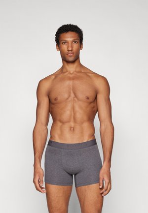 Graue Boxershorts mit einem elastischen Bund mit Logo, aus weichem Material gefertigt, mit einem enganliegenden Schnitt und glatter Textur.