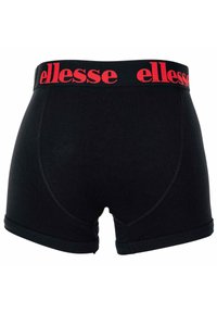 Schwarze Boxershorts für Männer mit rotem "ellesse" Markennamen auf dem Bund, von hinten gezeigt.