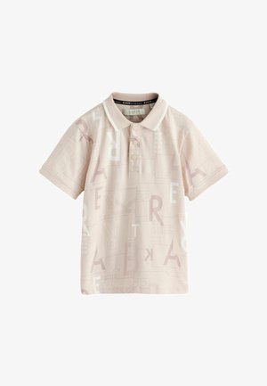 Gaiši rozā polo krekls ar īsām piedurknēm, kas rotāts ar atkārtojošos abstraktu burtu rakstu. Mīksts kokvilnas audums ar apkakli un trim pogām.