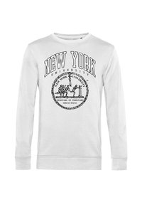 Weißes Sweatshirt mit einem schwarzen Druckdesign "NEW YORK UNIVERSITY" und einem Emblem mit Figuren und Text. Rippbündchen an Ärmeln und Saum.