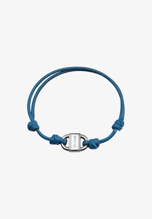 Niebieska pleciona bransoletka z cordu, z metalowym zapięciem w kolorze srebrnym z wygrawerowanym napisem "BREIL", akcentowana bezpiecznymi węzłami na obu końcach.