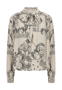 Beige blus med svart paisleyprint, med knytkrage, långa ärmar och knäppte manschetter. Slät tyg med intrikata mönster genomgående.