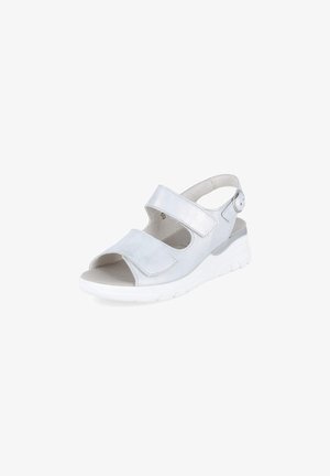 White open-toe sandal with adjustable velcro straps, cushioned heel, and slingback buckle for secure, comfortable fit.