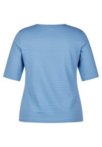 Helles blaues Kurzärmeltop mit strukturiertem Muster. Rundhalsausschnitt und lässige Passform. Glattes Material, das einen bequemen Stil bietet.