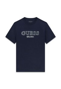 Marineblaues Baumwoll-T-Shirt mit dem Schriftzug "GUESS" in hellblauer Stickerei und "EST.1981" darunter in einer lässigen Schriftart. Kurze Ärmel, Rundhalsausschnitt.