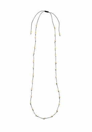 Black cord necklace with gold-tone beads, featuring a long, thin design. Beads are unevenly spaced along the cord, secured with adjustable ties.