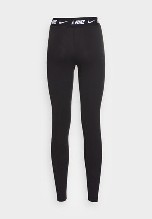Leggings atléticos negros con una cintura alta que presentan un logo blanco de Nike. La tela es suave y elástica, diseñada para ropa de actividad.