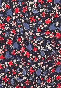 Dark fabric with a floral pattern featuring red, blue, and pink flowers, surrounded by green leaves on a navy background.