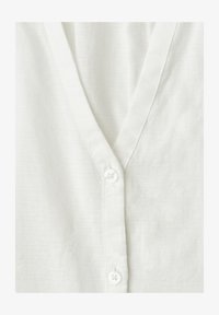 Sélectionné, off white