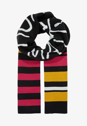 Écharpe noire avec des motifs abstraits blancs sur le dessus, et des rayures horizontales alternées en rose, noir, jaune et blanc aux extrémités.