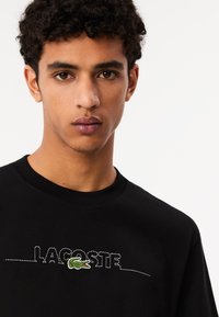 Lacoste Camiseta estampada - noir