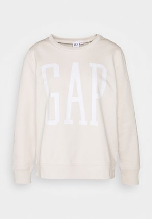 Sweat-shirt beige à manches longues avec grand logo GAP blanc sur le devant et poignets et ourlet côtelés.