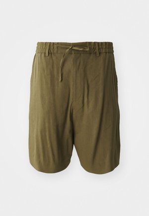 Olive green shorts made of lightweight fabric, featuring an elastic waistband with a drawstring, and side pockets for added convenience.