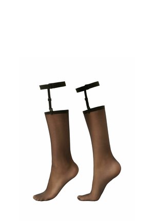 Bas résilles noires transparentes jusqu'aux genoux avec des bords élastiques et des bretelles ajustables. Texture lisse, design avec pied, et teinte marron clair.
