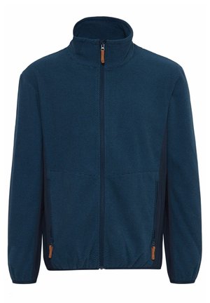 Sötétkék zipzáros dzseki texturált anyagból, magas gallérral, két oldalsó zsebbel és bőr cipzárhúzóval.