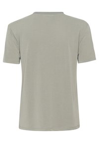 T-shirt verde chiaro a maniche corte realizzato in tessuto morbido. Caratterizzato da un collo rotondo e cuciture pulite e semplici senza motivi o grafiche.