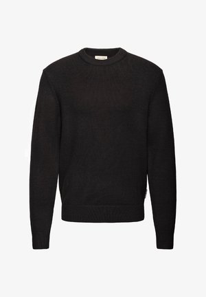 Svart genser i ribbestrikket design med rund hals, lange ermer og tettsittende kant. Minimal merking på siden.