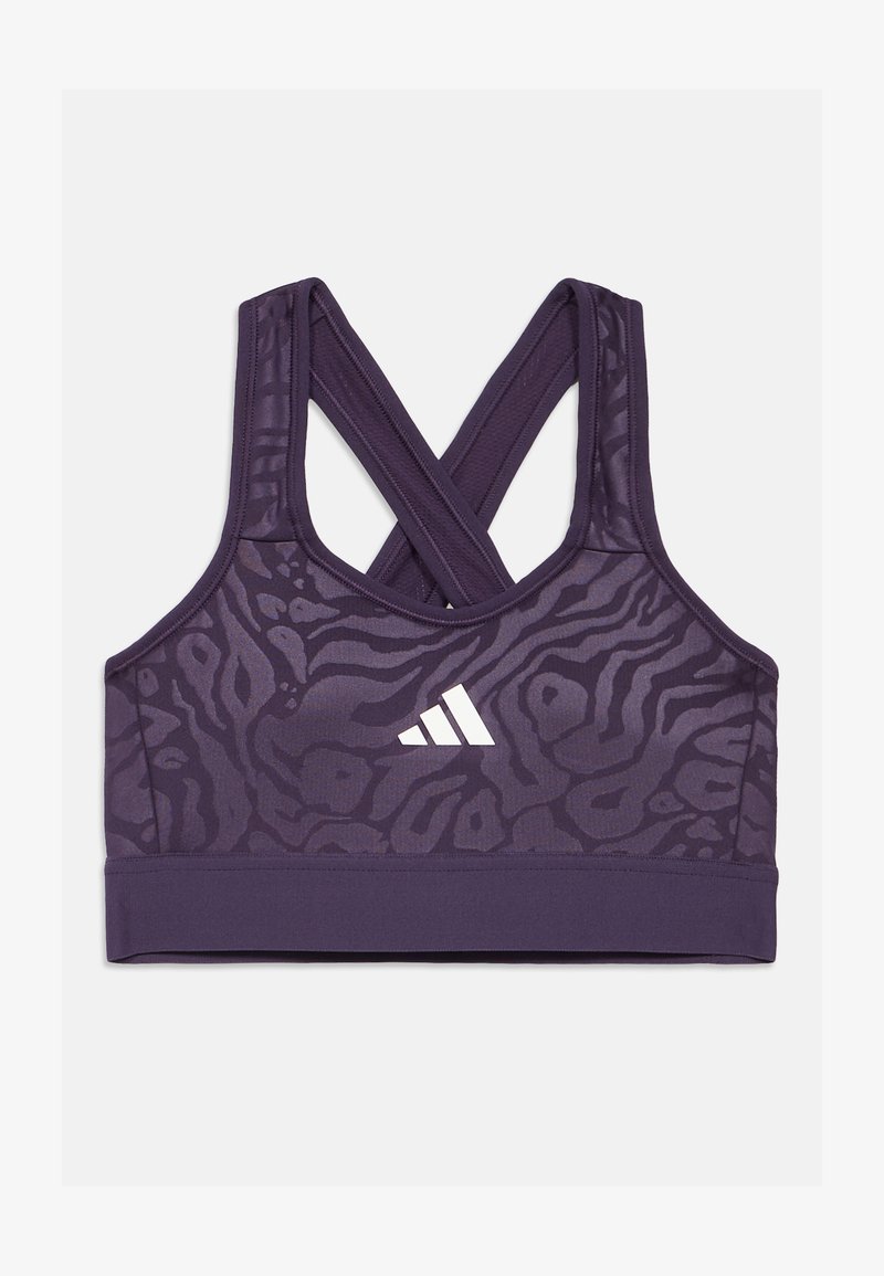 Lilla spordirinnahoidja ristatud rihmadega, millel on tekstureeritud loomamuster ja eesvalgel Adidas logo. Veniv kangas.