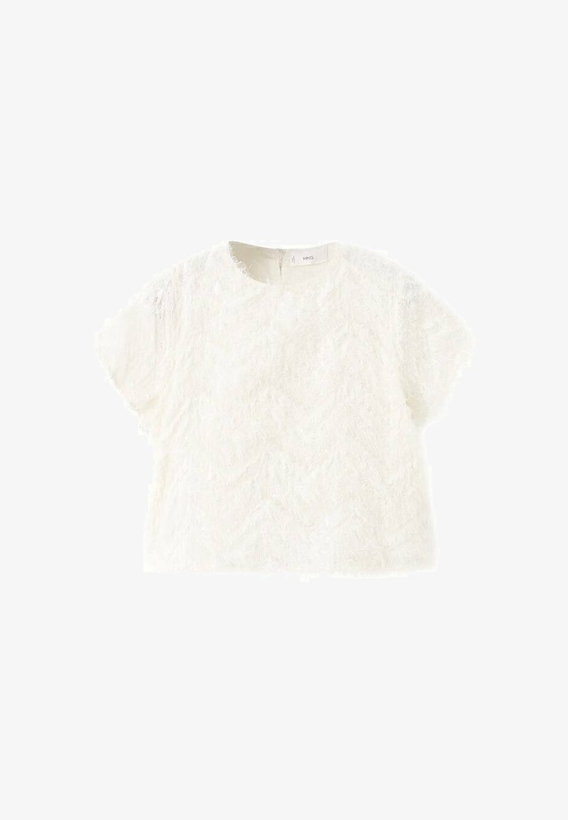 Top bianco a maniche corte realizzato in tessuto strutturato con un motivo ondulato. Presenta un collo rotondo e una cerniera sul retro nascosta.