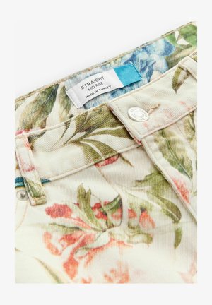 Lillelille musteriga keskmise tõusuga teksad, millel on kreemjas taust ja roosa ning roheline lillede kuju. Sisaldab metallist nööpi ja kangasildiga.