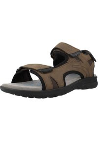 Sandalia marrón con paneles de malla, correas ajustables de velcro, plantilla acolchada y suela de goma con un patrón de relieve para mayor agarre.