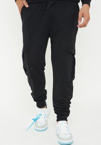 LEGEA - Cargo trousers - nero Thumbnail Image 1