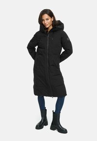 Black long puffer coat with a hood, front zipper, and side pockets. Finished with a textured fabric and slightly padded design.