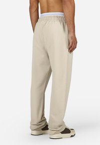 Pegador LOGO WIDE  - Tepláky - washed cozy beige black