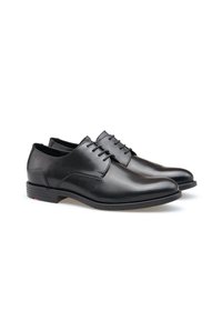 Scarpe eleganti in pelle nera con finitura liscia, caratterizzate da punta rotonda, chiusura stringata e suola in gomma a profilo basso.