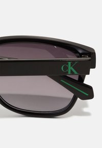 Calvin Klein Jeans Ochelari de soare - black