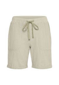 Hellbeige Baumwollshorts mit elastischem Bund, Kordelzug und zwei Seitentaschen. Umgeschlagene Säume verleihen dem Design Details.