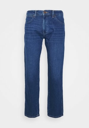 Dunkelblaue Jeans aus Denim mit klassischem geradem Bein, fünf Taschen und einem Metallknopfverschluss am Bund.