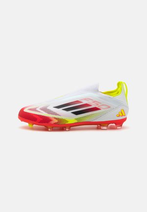 adidas Performance F50 ELITE LACELESS FIRM GROUND KIDS - Chaussures de foot à crampons - footwear white/core black/solar yellow