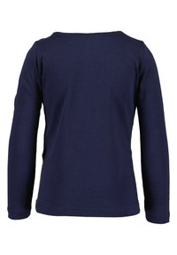 Chemise à manches longues bleu marine en coton doux, présentant un col rond et une texture lisse sans motifs ni ornements visibles.