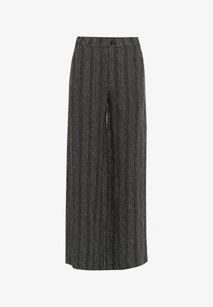 Wide-leg pants in black and white striped fabric. Features a button closure and a smooth texture. The design offers a loose fit and relaxed silhouette.
