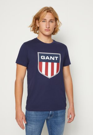 RETRO SHIELD - Print T-shirt - evening blue