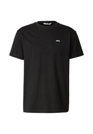 Zwart T-shirt met korte mouwen, ronde hals en klein wit "UNFAIR" tekstlogo op de linkerborst.