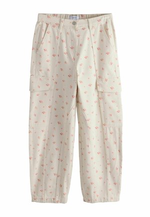 Beige cargo pants with pink floral print, front pockets, button waist, and elasticized hems.