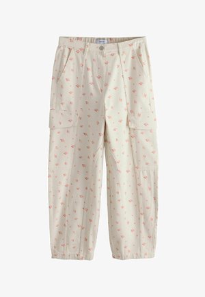 Beige cargo pants with pink floral print, front pockets, button waist, and elasticized hems.