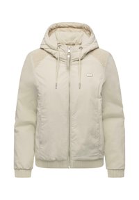 Jasnobeżowa kurtka na suwak z kapturem, ściągaczami przy rękawach i detalami na ramionach. Gładka tekstura i minimalistyczny design.