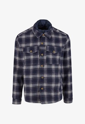 Geruite marineblauwe en witte shirtjas, voorzien van een knoopsluiting, twee borstzakken en een opgevouwen kraag met een gewatteerde voering.