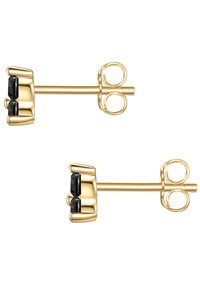 Zlatne naušnice s poliranim završetkom, koje imaju dva crna dragulja postavljena u dizajnu kandže. Teksturirane podloge za sigurnu nosivost.