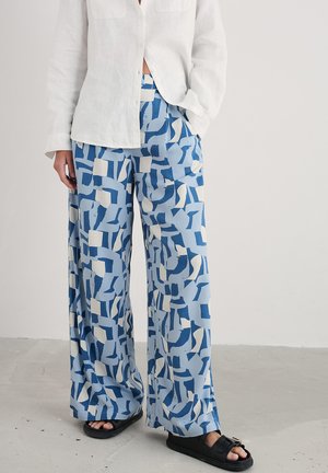 MORESK - Pantaloni - blue torn shapes sailor