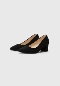 Black suede mid-heel pumps with a pointed toe and a smooth texture. Design features a low block heel and a sleek silhouette.