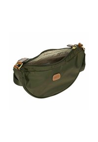 Borsa a tracolla verde in nylon con forma arrotondata, hardware dorato e un'etichetta in pelle marrone. L'interno presenta una fodera chiara.