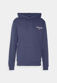 Námořnická modrá mikina s kapucí vyrobená z bavlny, má přední kapsu, žebrované manžety a malé logo na hrudi. Hladká textura, casual design.